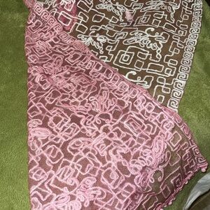 Sheer pink fabric woven with wool shawl scarf with wool pom pom accents